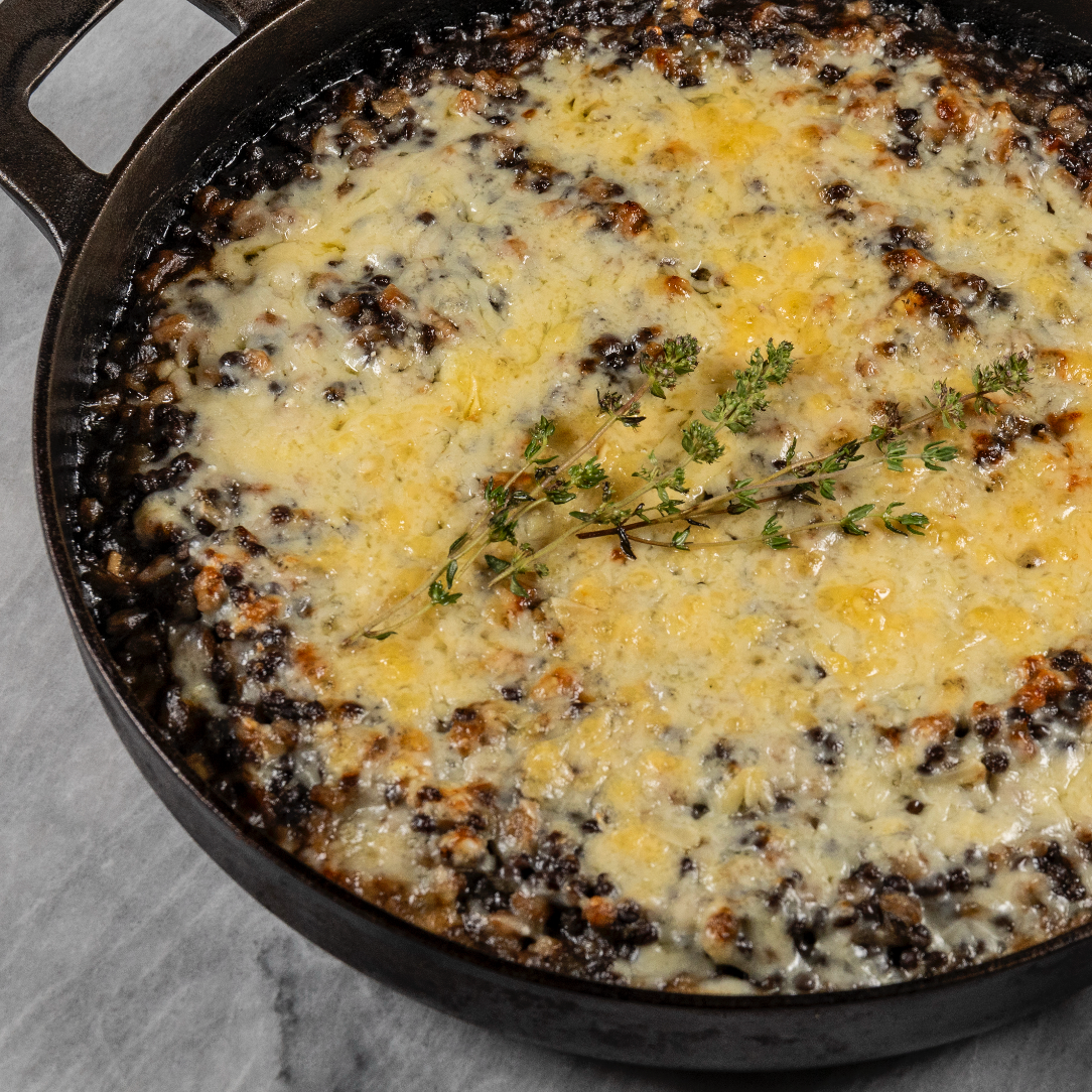 French Onion Baked Beluga Lentils with Farro and Gruyère